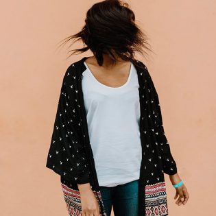 HER WHITE VEST